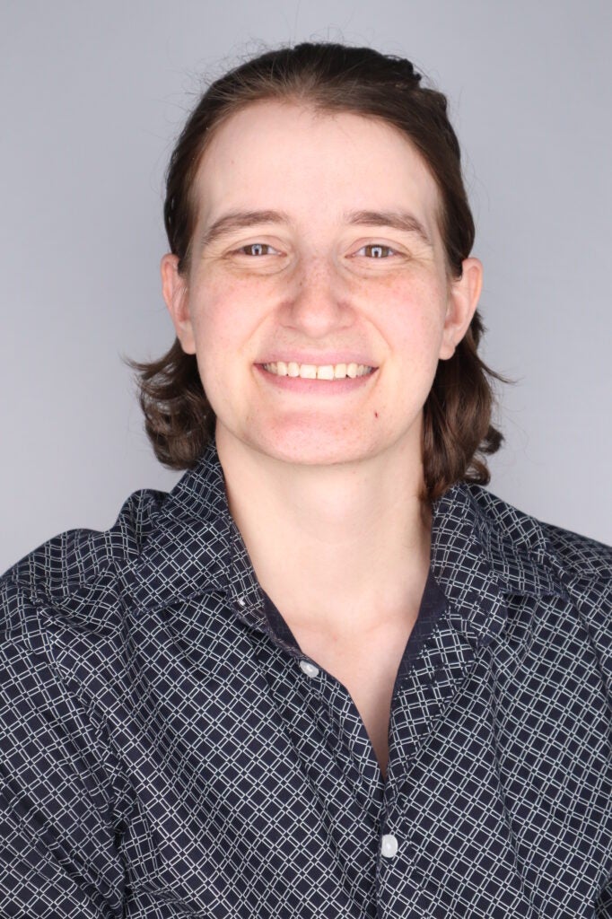 Anna Skarr, a white woman, smiling straight ahead
